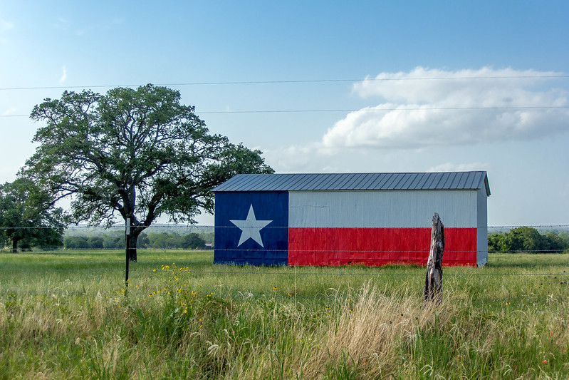 Rural Texas barn with Texas Flag painted on the side